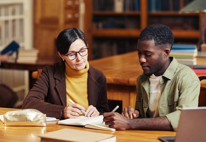 A counsellor guiding a student during a one-on-one session